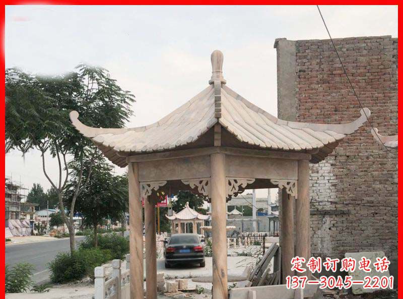 深圳公园晚霞红六角石凉亭雕塑