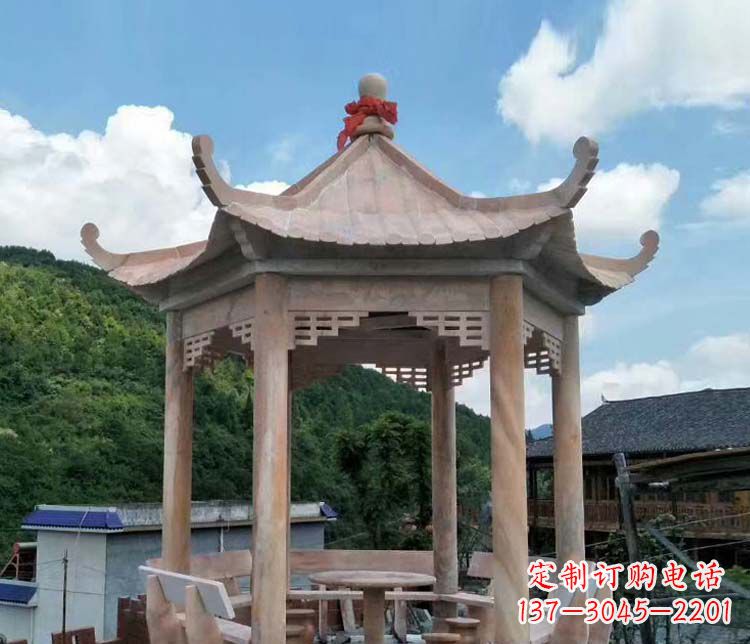 深圳一流的公园晚霞红六角石雕凉亭