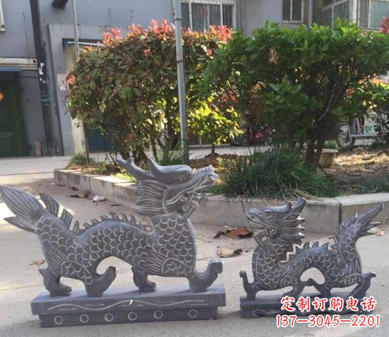 深圳青石雕刻母子龙是由中领雕塑工厂家生产的一…