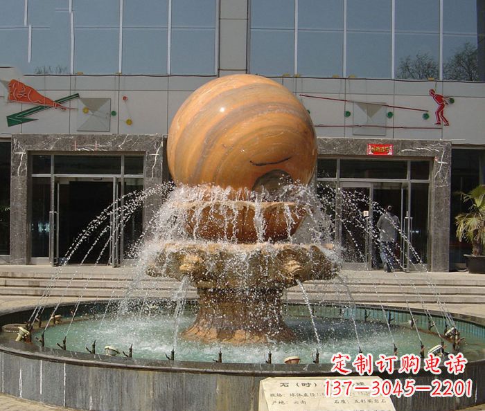 深圳石来运转球晚霞红风水球石雕